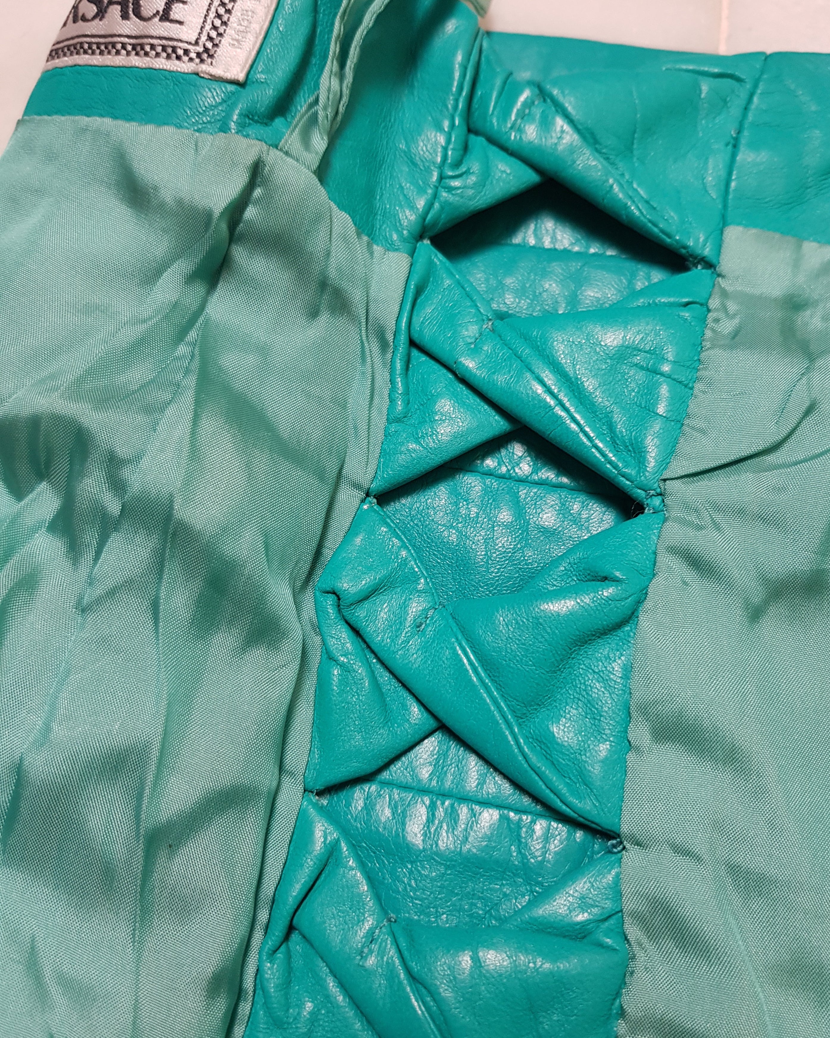 VERSACE GIANNI Leather cut out twisted Mini Skirt circa 1990